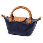 Elegancka Damska skórzana torebka do reki kuferek